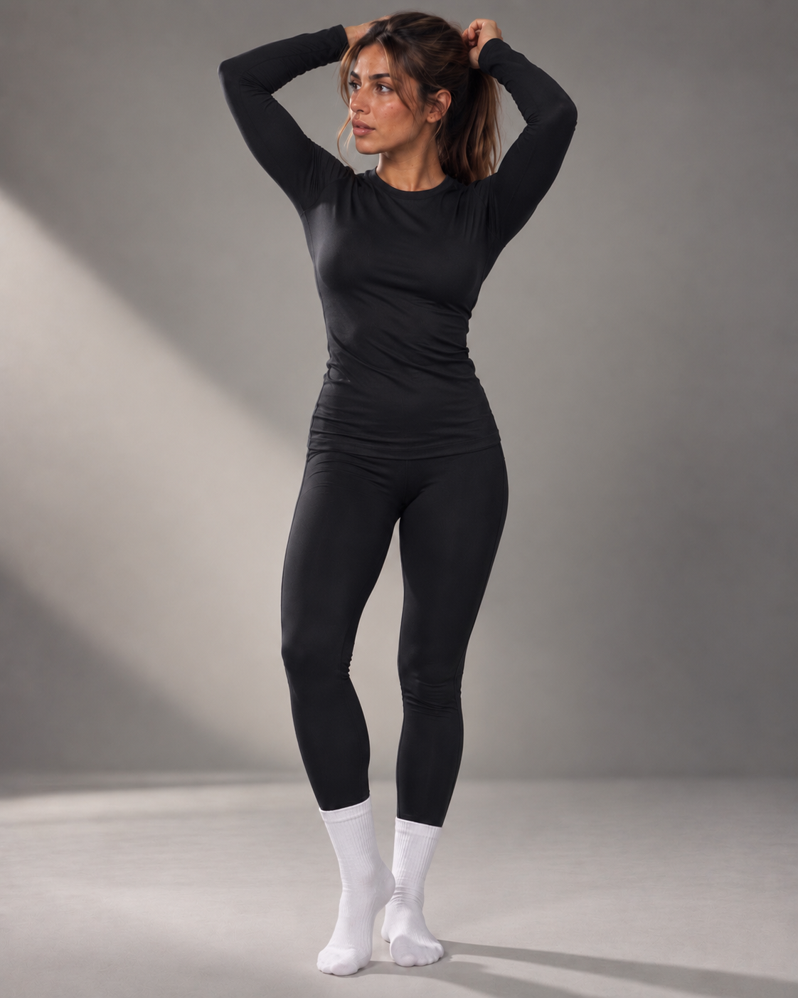 Woman wearing a black thermal layer